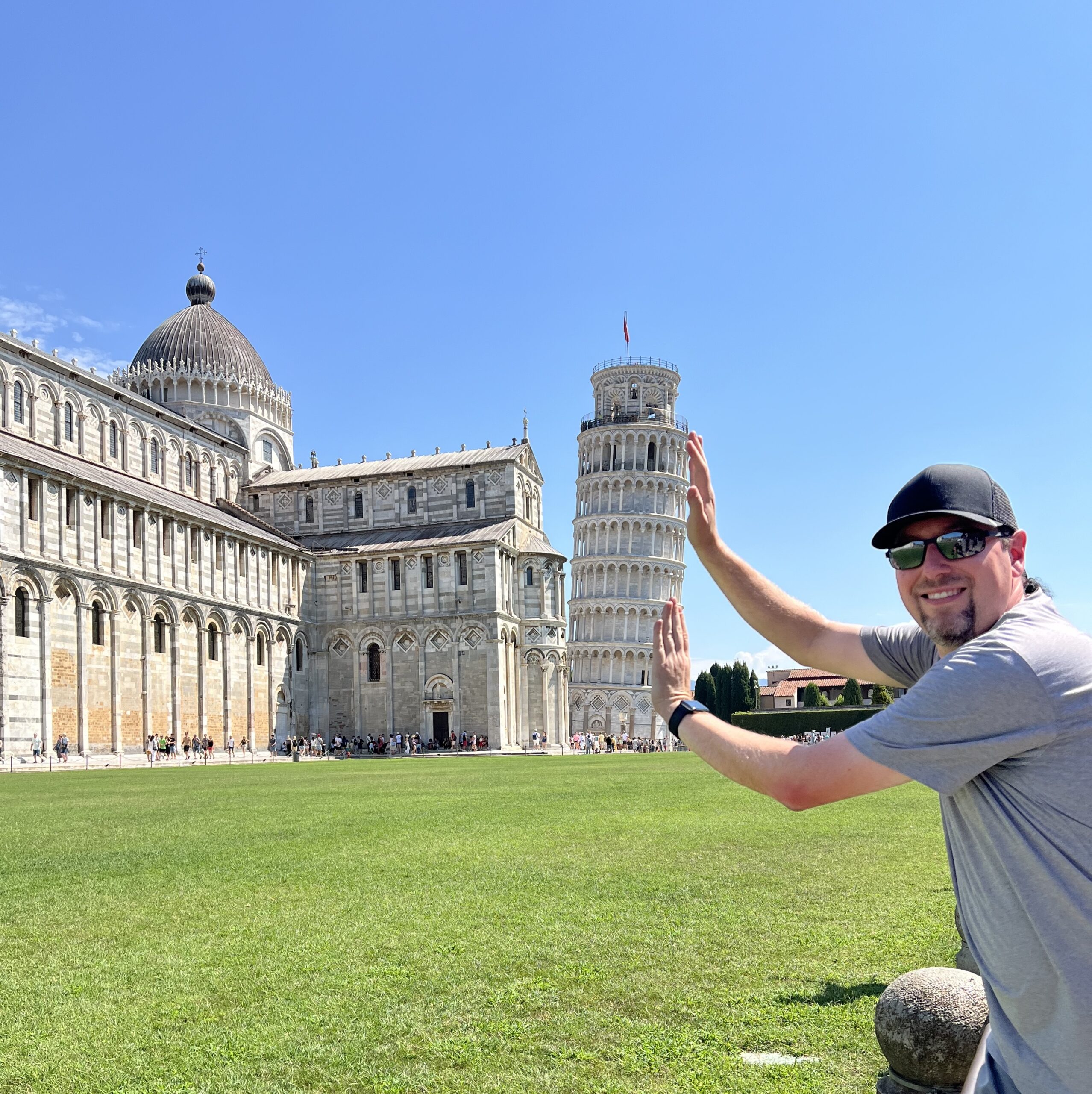Leaning Tower Shot Holding Up The Leaning Tower of Pisa | Photo Credit: Robert Farrington